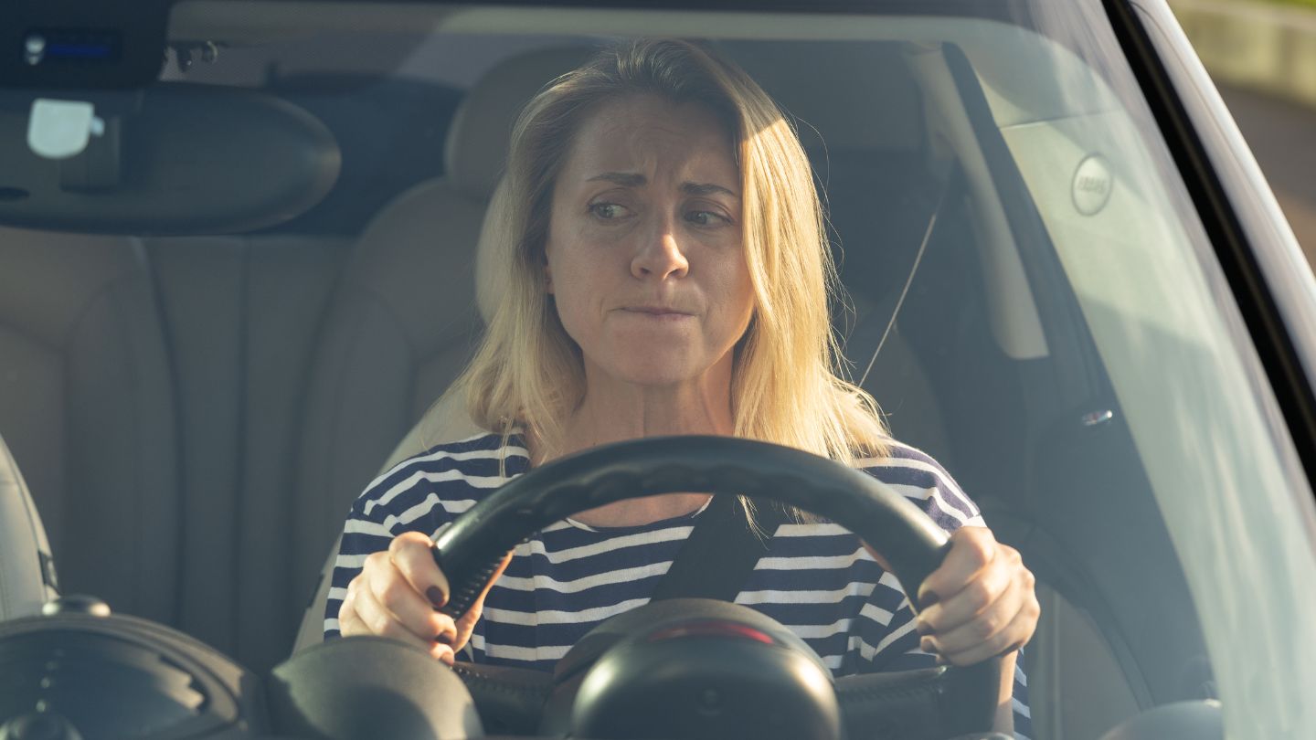 Woman Feeling Anxiety While Driving A Car